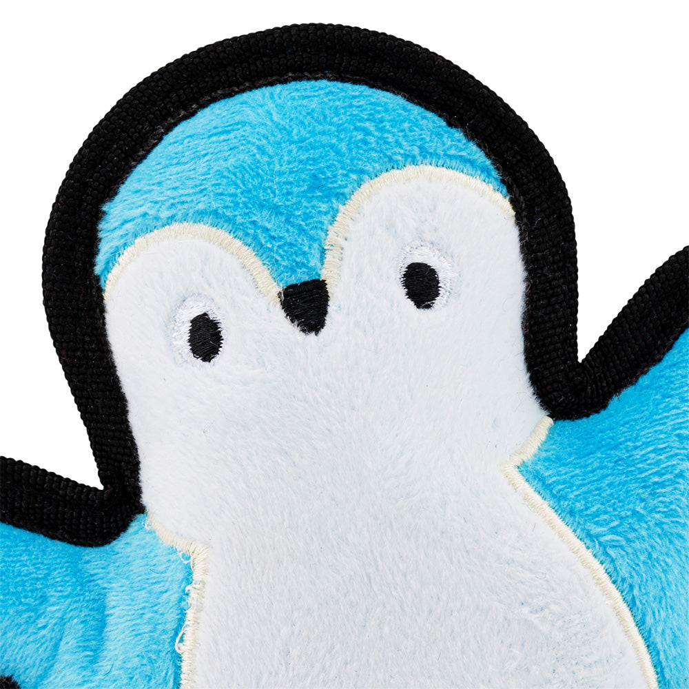 A close-up of the penguin dog toy.