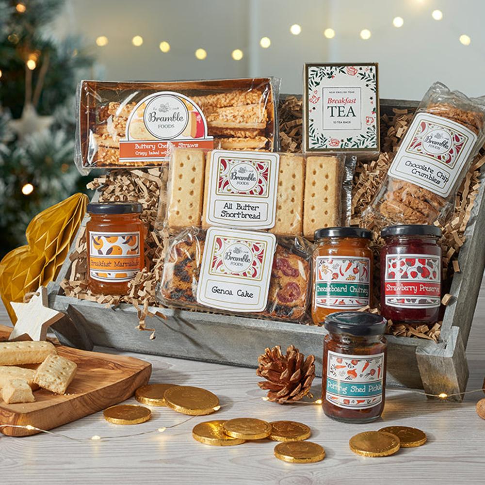 A wooden crate filled with lots of festive food.