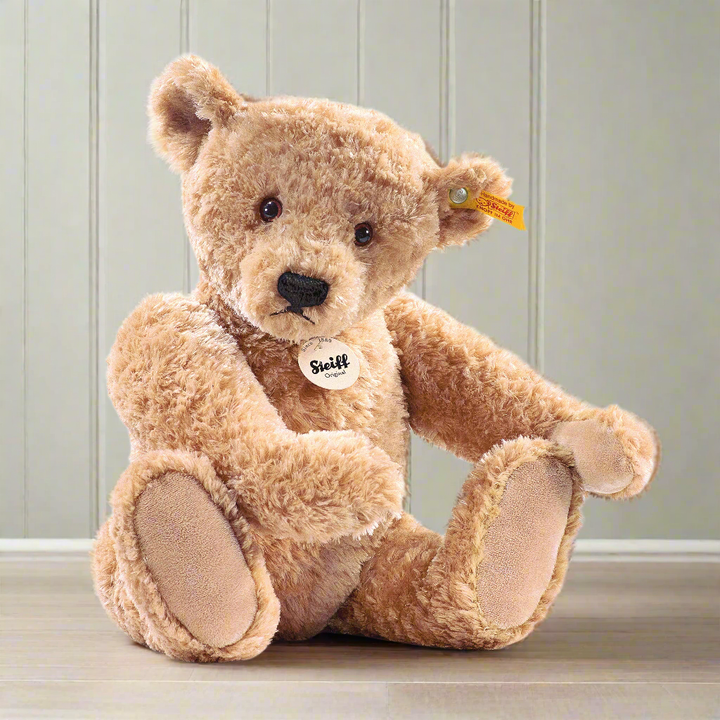 Elmar Teddy Bear sits upright.