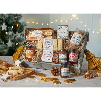 A wooden crate filled with lots of festive food.