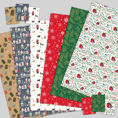 A selection of six different designs of wrapping paper and tags.