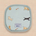 A pale blue pot grab with pattern of playing Labrador puppies and Guide Dogs label logo on a peach background.