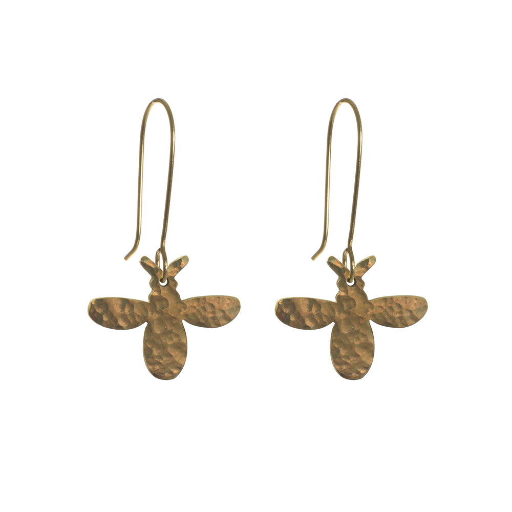 A close-up of the Fair Trade Hammered Brass Bee Earrings.