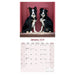 Two Border Collies are pictured in front of  a raspberry coloured door for the month of January.