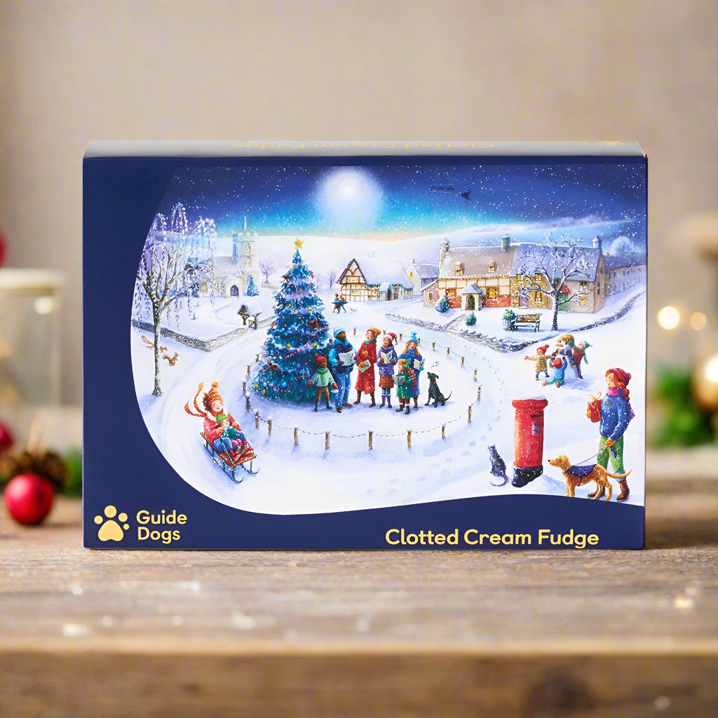 A packaging design of a village celebrating Christmas is wrapped around the Clotted Cream Fudge.