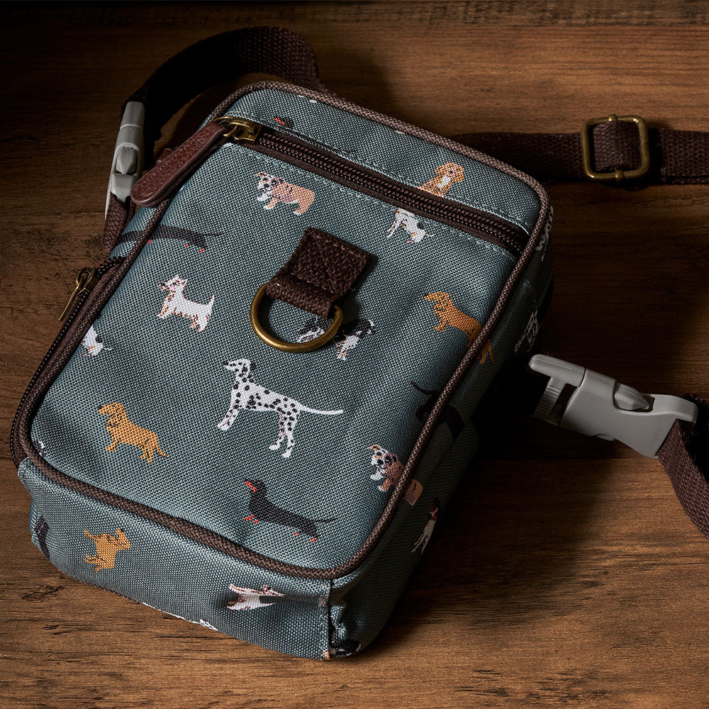 A bag printed with dog designs and brown trims 