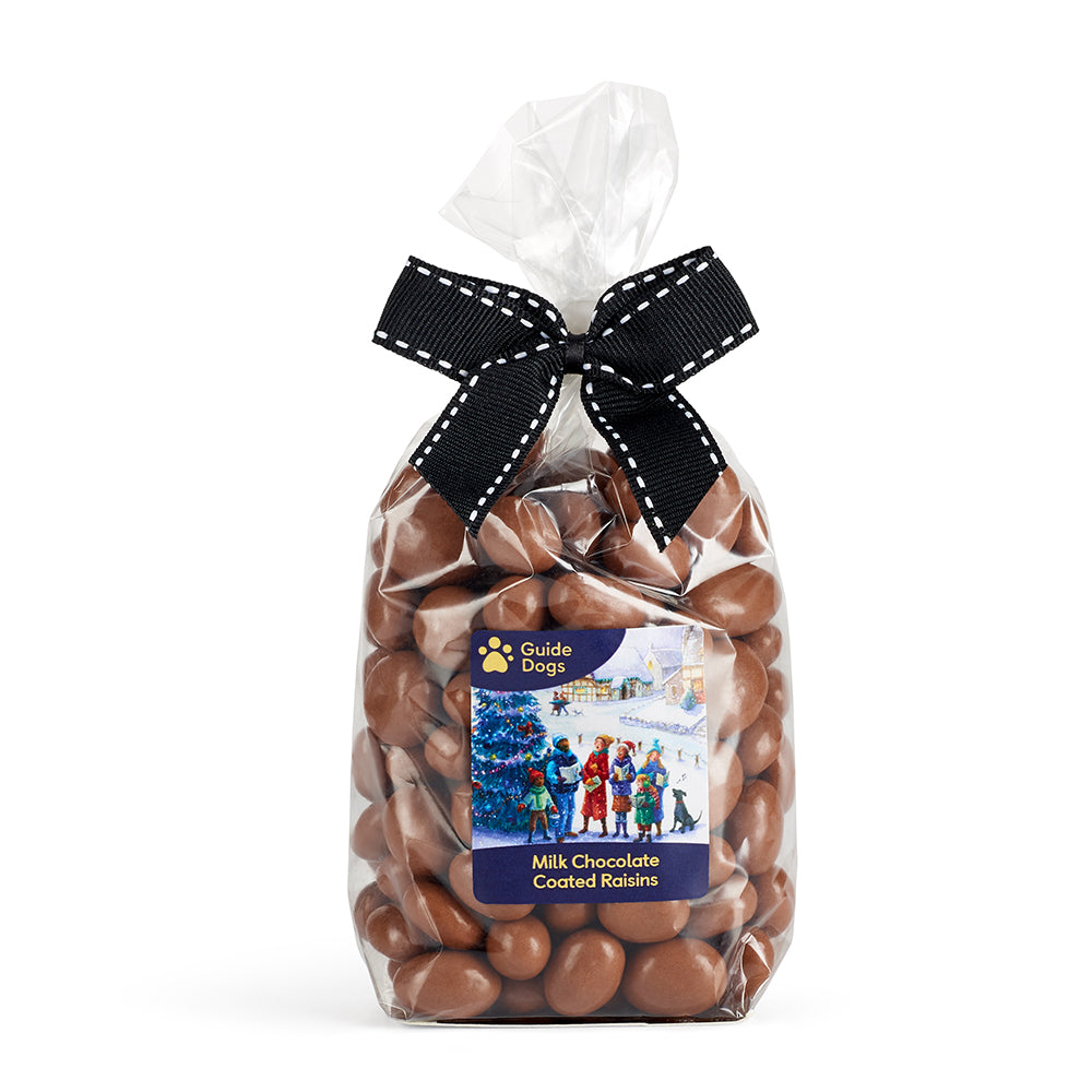 A bag of Milk Chocolate Coated Raisins is tied with a black ribbon.