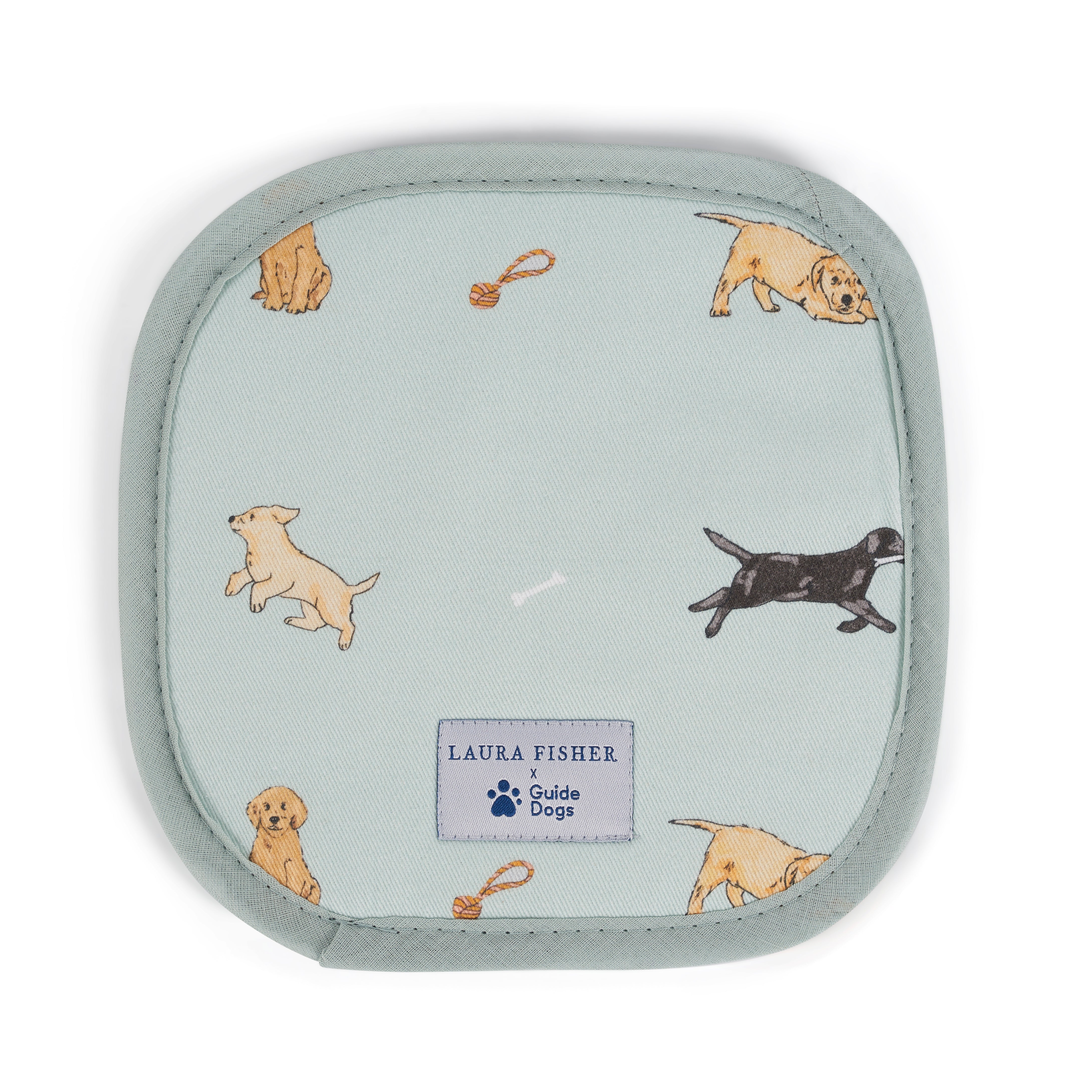 A pale blue pot grab with pattern of playing Labrador puppies and Guide Dogs label logo