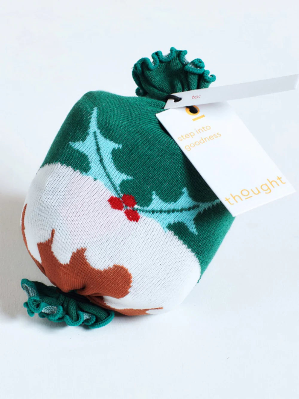 A knitted bag with Christmas pudding design