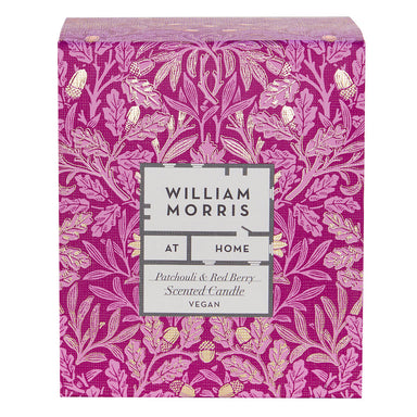 Magenta packaging holds the William Morris at Home Patchouli & Red Berry Scented Candle.