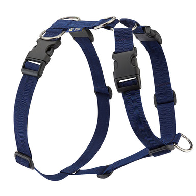 A close up of a navy dog harness with the Guide Dogs logo. 