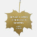 A gold hanging leaf with the quote 'to plant a garden is to believe in tomorrow'. Audrey Hepburn's name appears below. 
