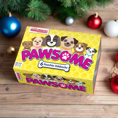 A yellow box with dog illustrations and the words Pawsome 6 Poochie Odd Socks