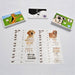 A close up image of game components for the Woof board game.