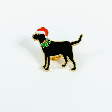 Black labrador standing pose badge, dog is wearing a holly collar and red Christmas hat