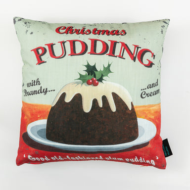 A cushion with illustrated Christmas pudding design, pale green background 
