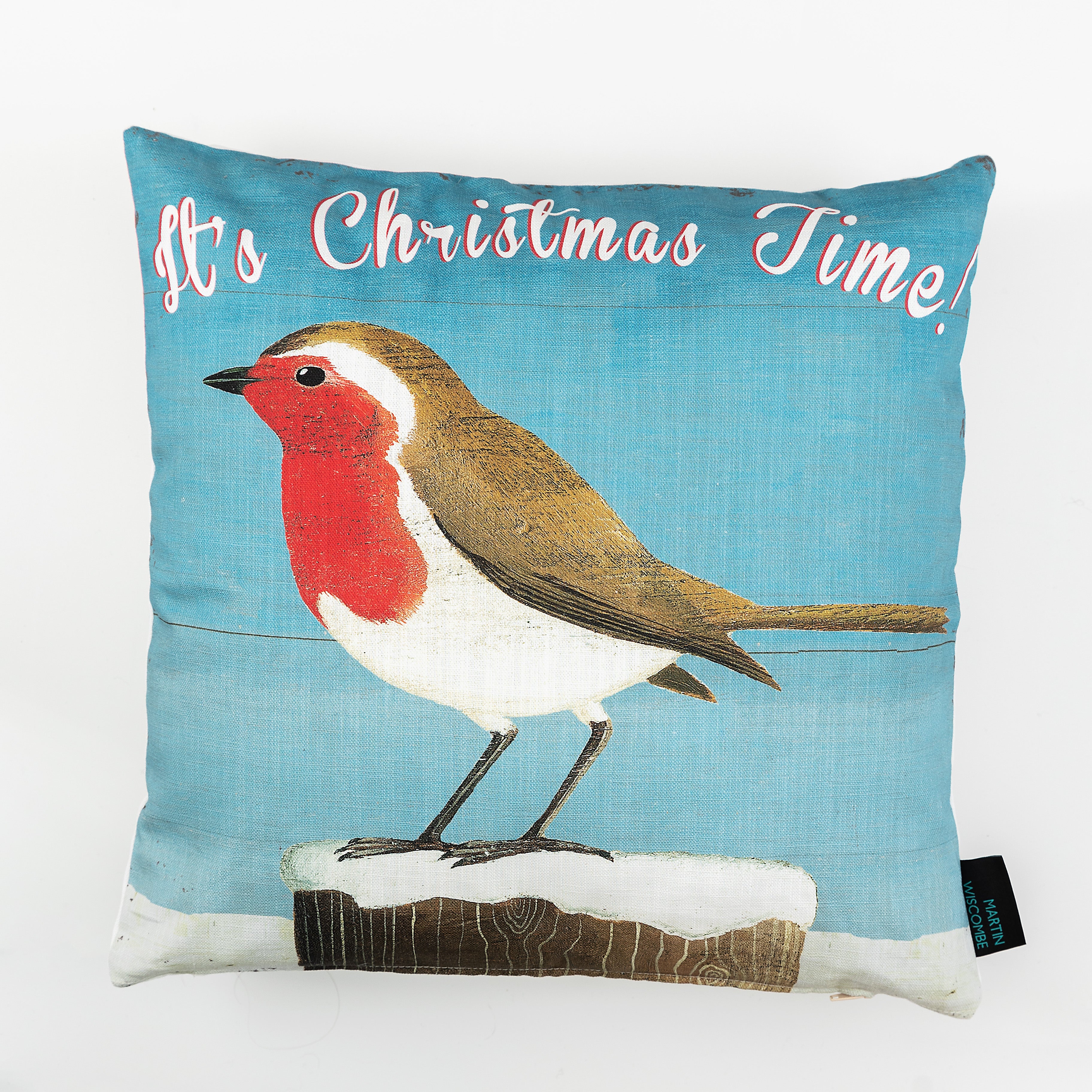 A cushion with illustrated robin in the snow on a blue background, with the words 'It's Christmas Time!' across the top.