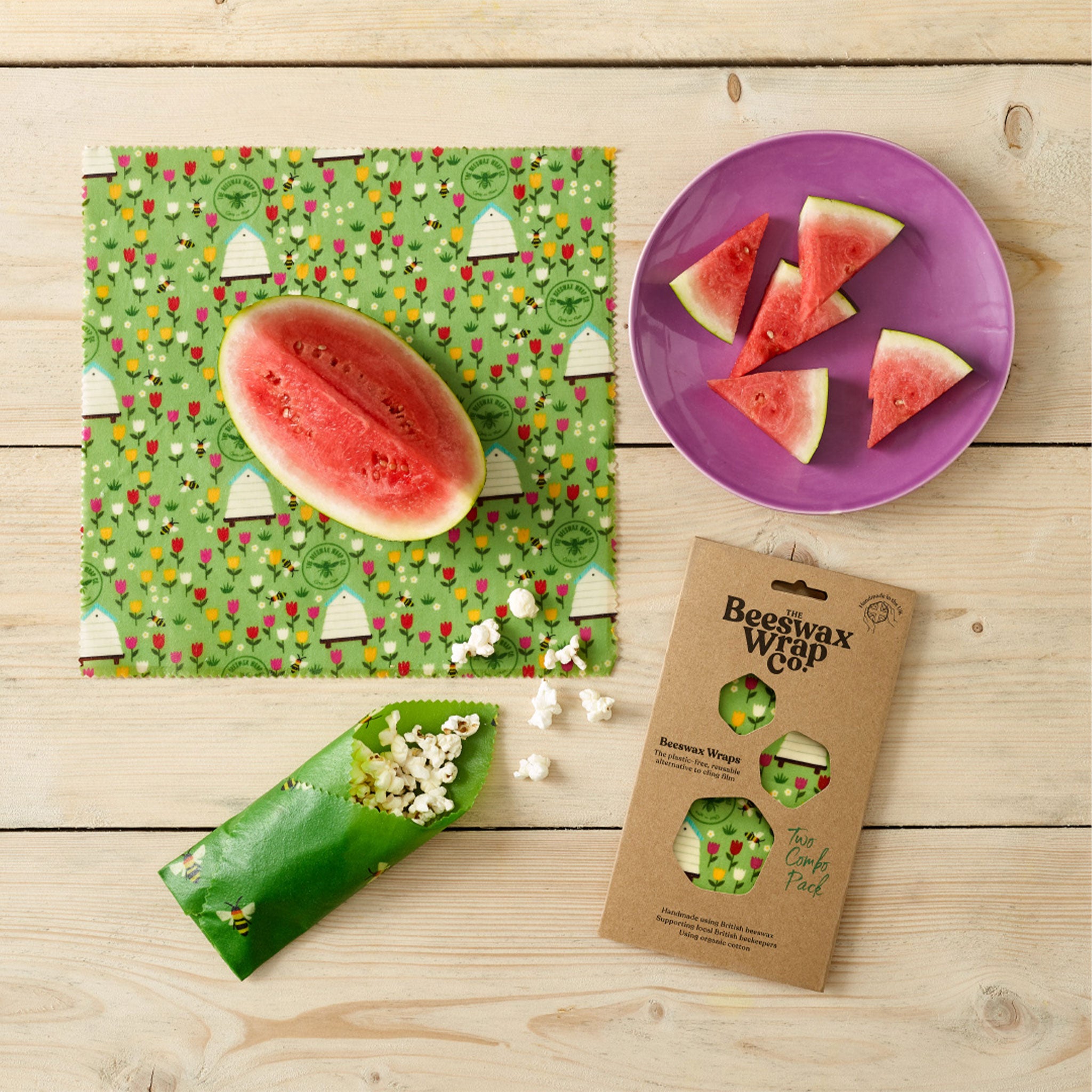 Lifestyle image of the Beeswrap combo pack being used to keep watermelon and popcorn fresh.