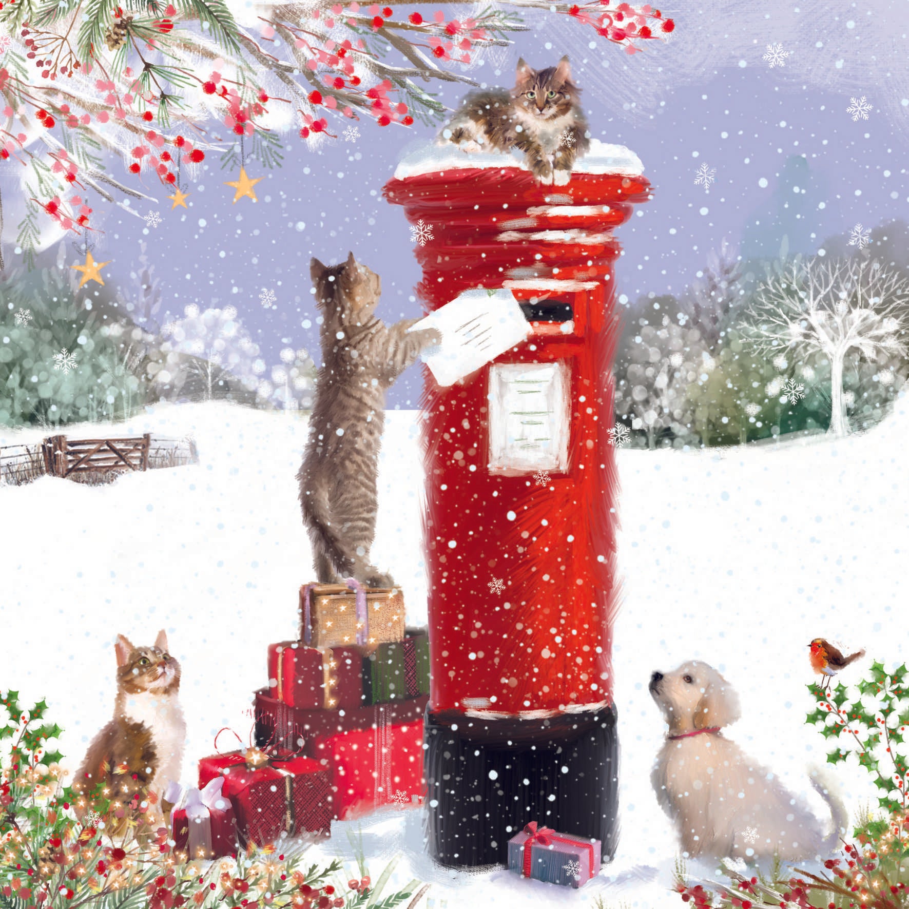 The design shows an illustrated snowy country setting and three tabby cats around a postbox with one posting a letter. There are a group of presents besides the postbox and a yellow Labrador puppy and robin looking on.