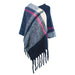 A checked poncho with shades of blue and pink made from a wool-feel material.