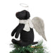 Against a white background, this image is a close up shot of the Black Labrador Tree Topper set on top of a Christmas tree.