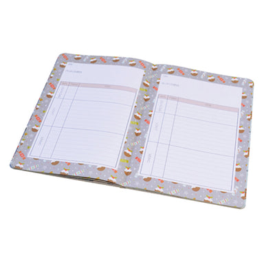 An example of the Christmas Planner notepad pages - the pages have a border made of Christmas puddings. 