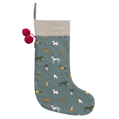 A teal blue stocking with overall pattern of dogs wearing Christmas hats and scarves.  The stocking has two red pompoms and a hanging loop.