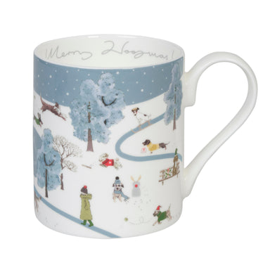 A china mug with a snowy scene showing a wintry park with dogs and walkers. The words Merry Woofmas! are written inside the rim of the mug.