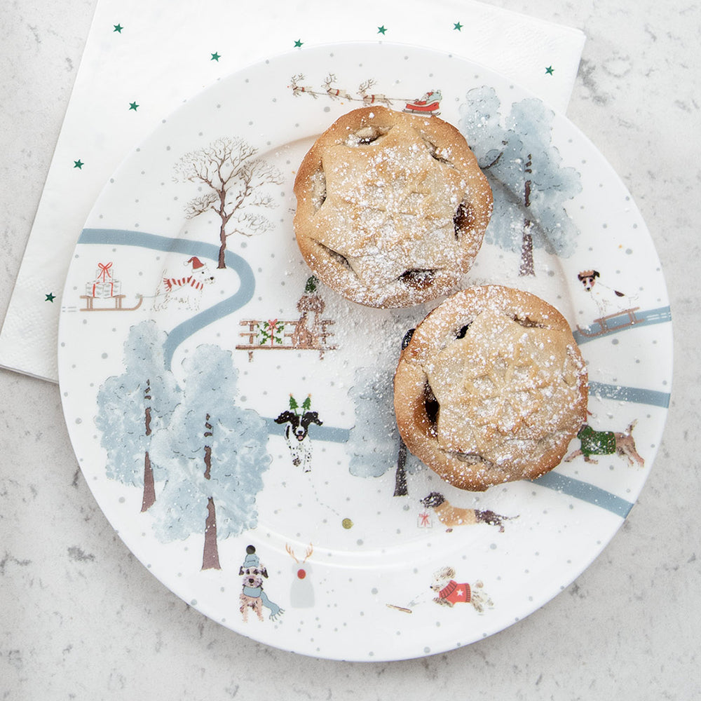 A Christmas design plate with 2 mince pies