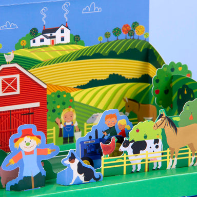 A bright and colourful close-up of a children's cardboard farmyard