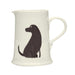 A close up of a white ceramic jug with an illustration of a Labrador on the outside.