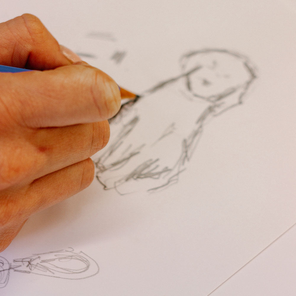 laura fisher sketching puppy design