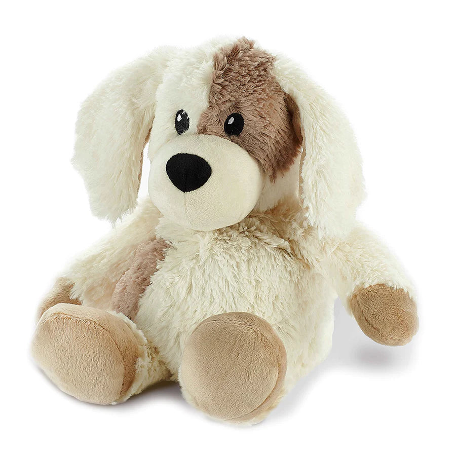 Cream soft toy puppy with brown patch over his eye