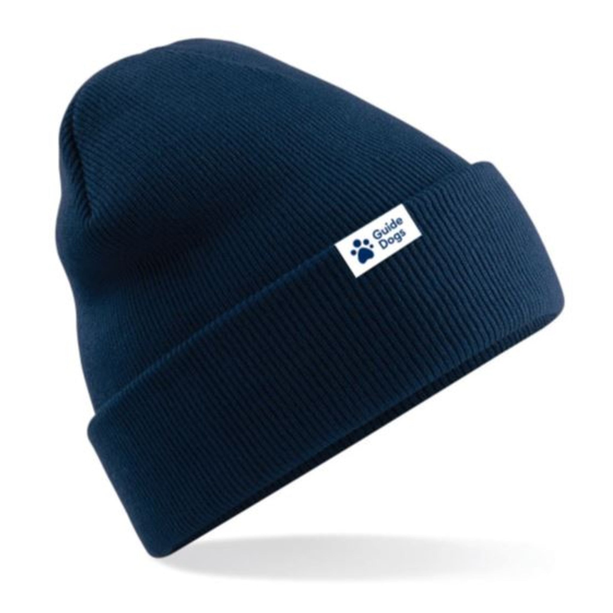 A close up of the navy blue Guide Dogs beanie hat with the Guide Dogs logo on the turn up section.