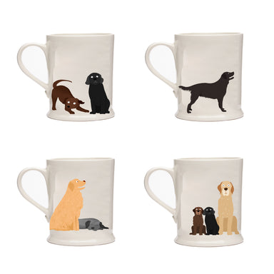 A collection of four white ceramic mugs, with images in a two by two formation. Top left is a mug with one Chocolate and one Black Labrador puppy playing. Top right is a mug with a standing Black Labrador. Bottom left is a mug with a sleeping Black Labrador and a sitting Golden Retriever. Bottom right is a mug with a Golden Retriever and two Labrador puppies, one Chocolate, one Black.