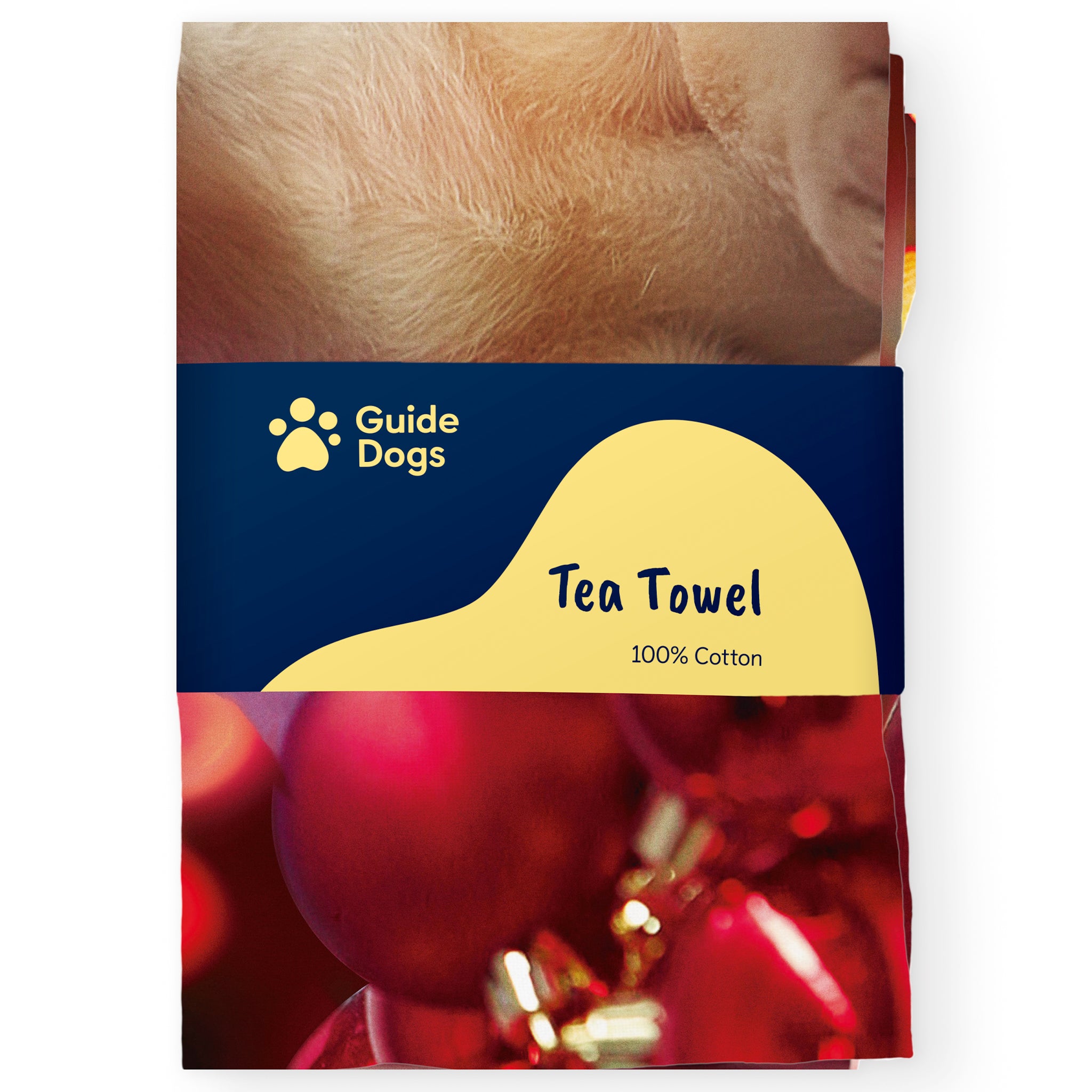 A folded Guide Dogs Christmas tea towel is folded into Guide Dogs branded packaging.