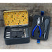 The tool tin is open displaying the contents, with jewellers screwdrivers and a tape measure, and an interchangeable screwdriver set.